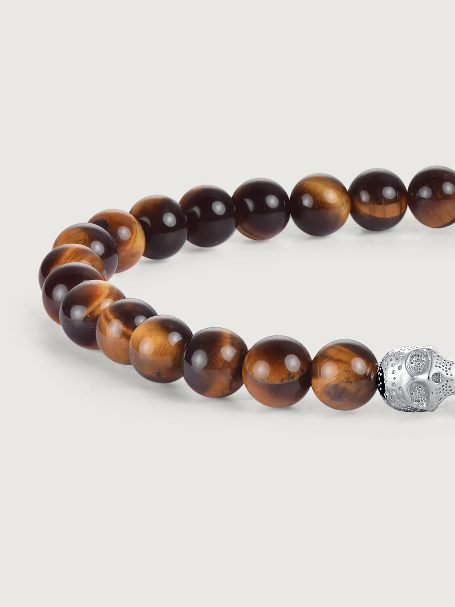 Detaliu bratara tiger eye cu craniu argint 925