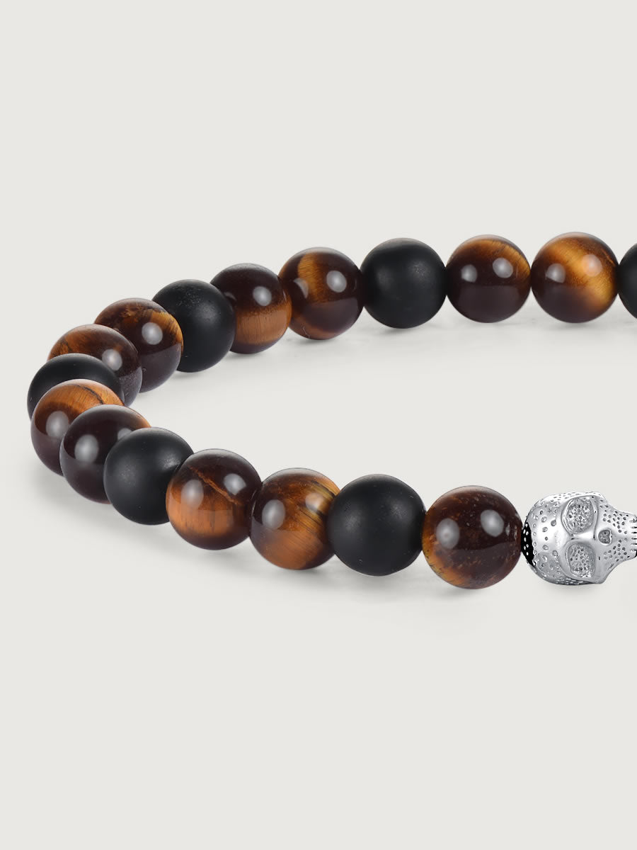 Detaliu bratara tiger eye si onix cu craniu argint 925