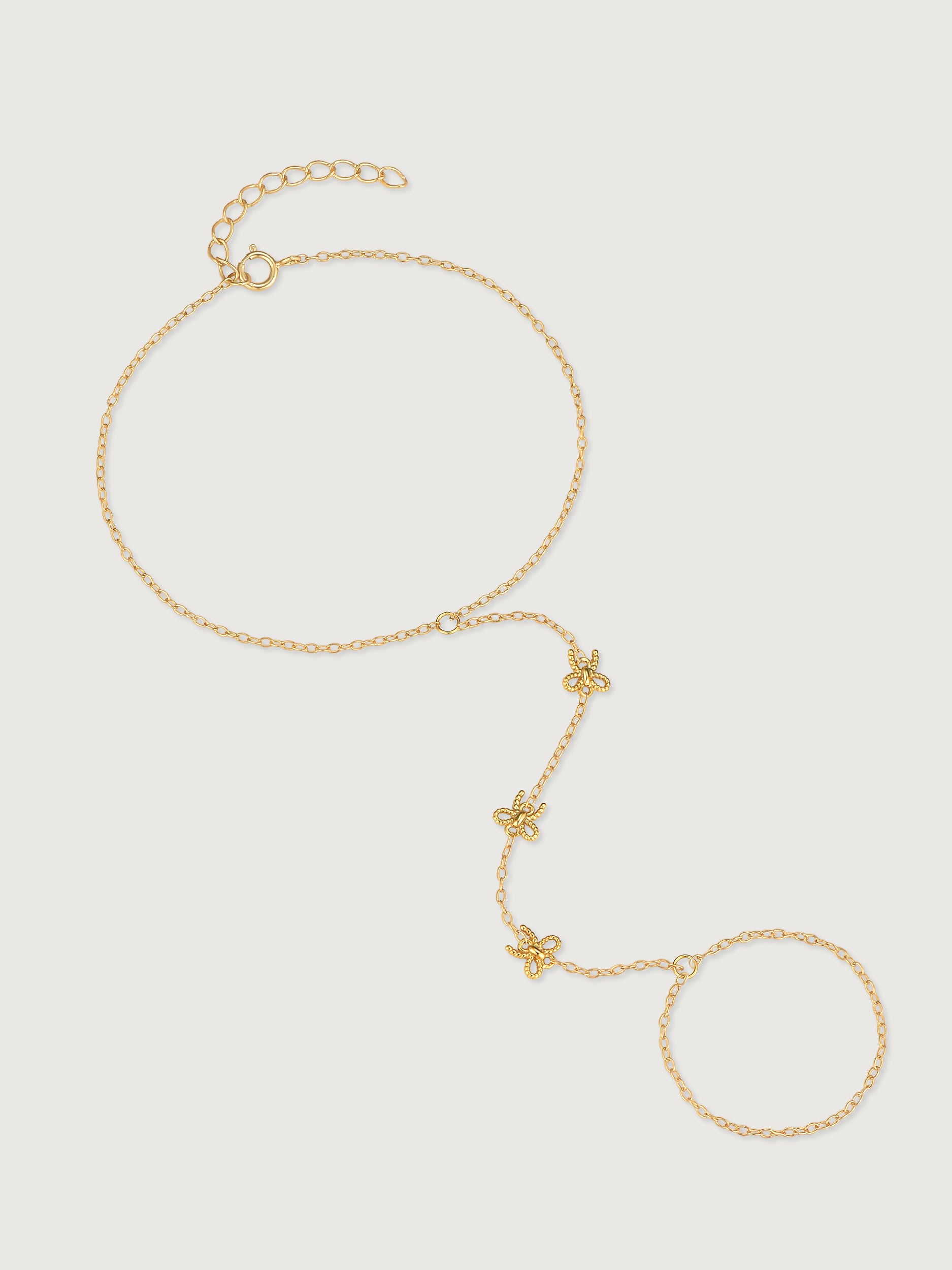 Brățară hand chain aurie cu funde decorative