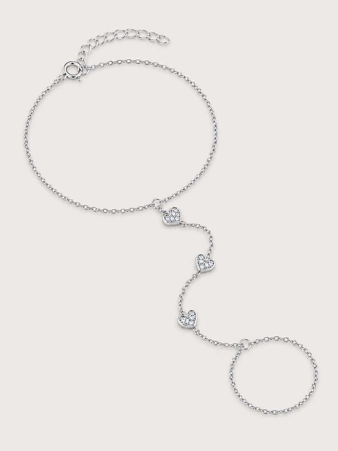 Brățară hand chain argintie cu inimioare și zirconii