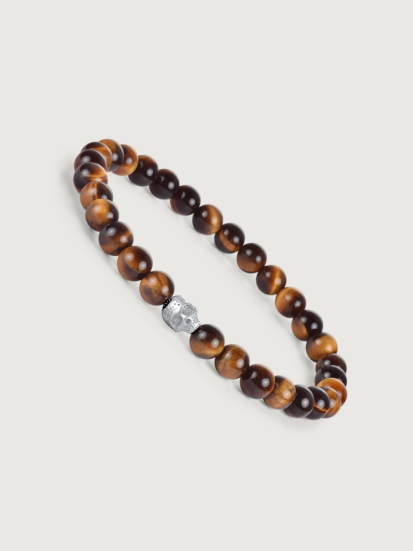 Bratara barbati cu pietre tiger eye si element craniu din argint