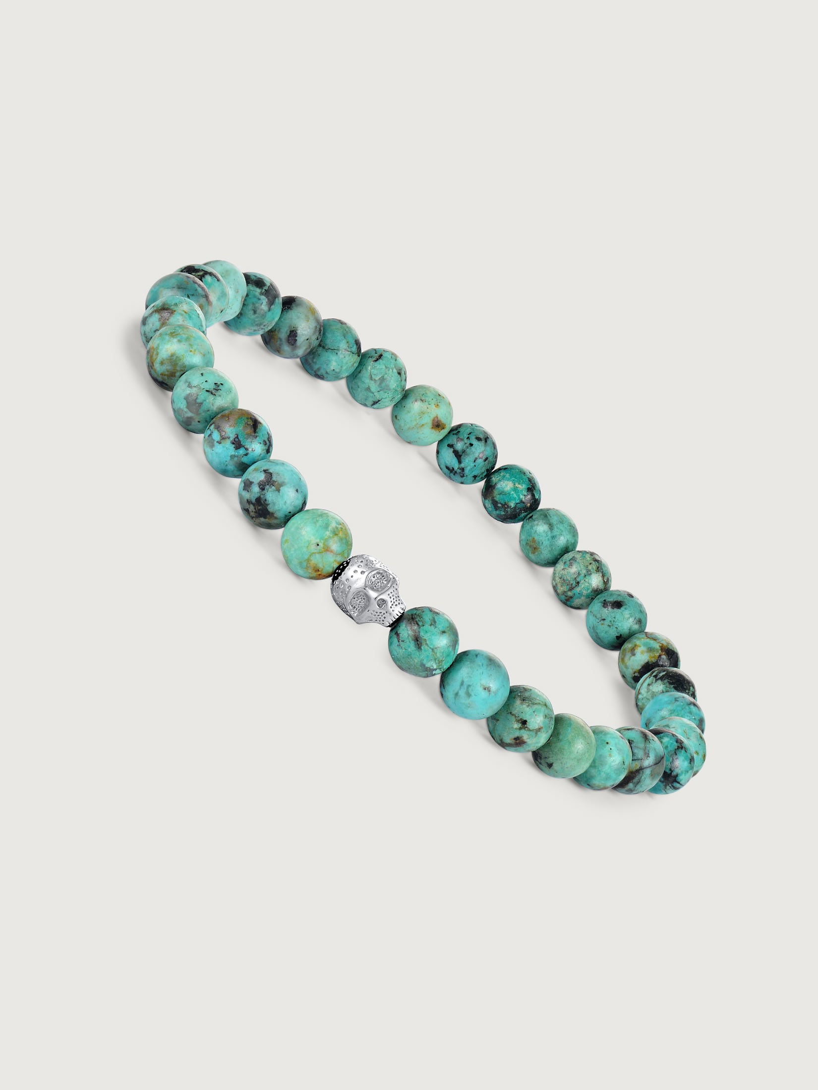 Bratara barbati cu pietre turcoaz african si element craniu din argint