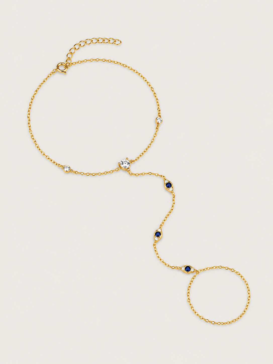 Brățară hand chain aurie cu zirconii albastre