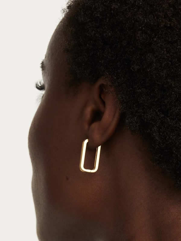 Cercei aurii design geometric statement