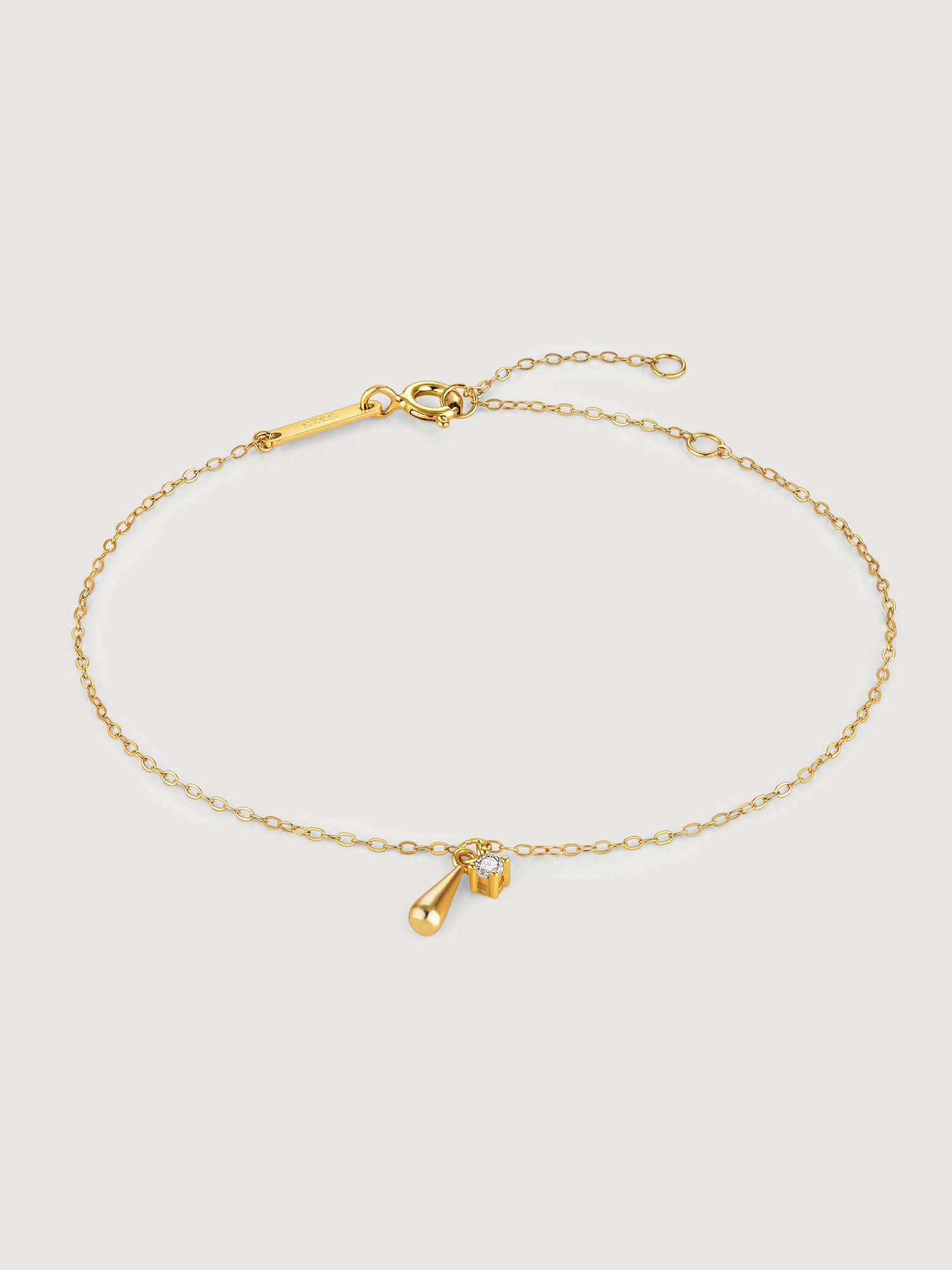 Brățară din argint aurie cu pandantiv picătură și zirconiu