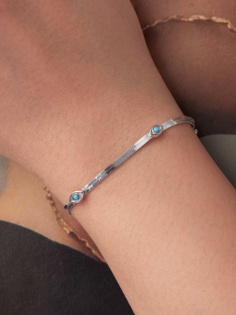 Brățară argint cu ochi protector și pietre turcoaz design elegant și simbolic